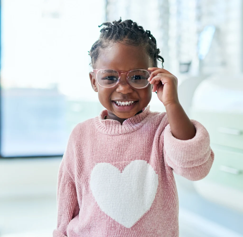 girl smiling wearing glasses